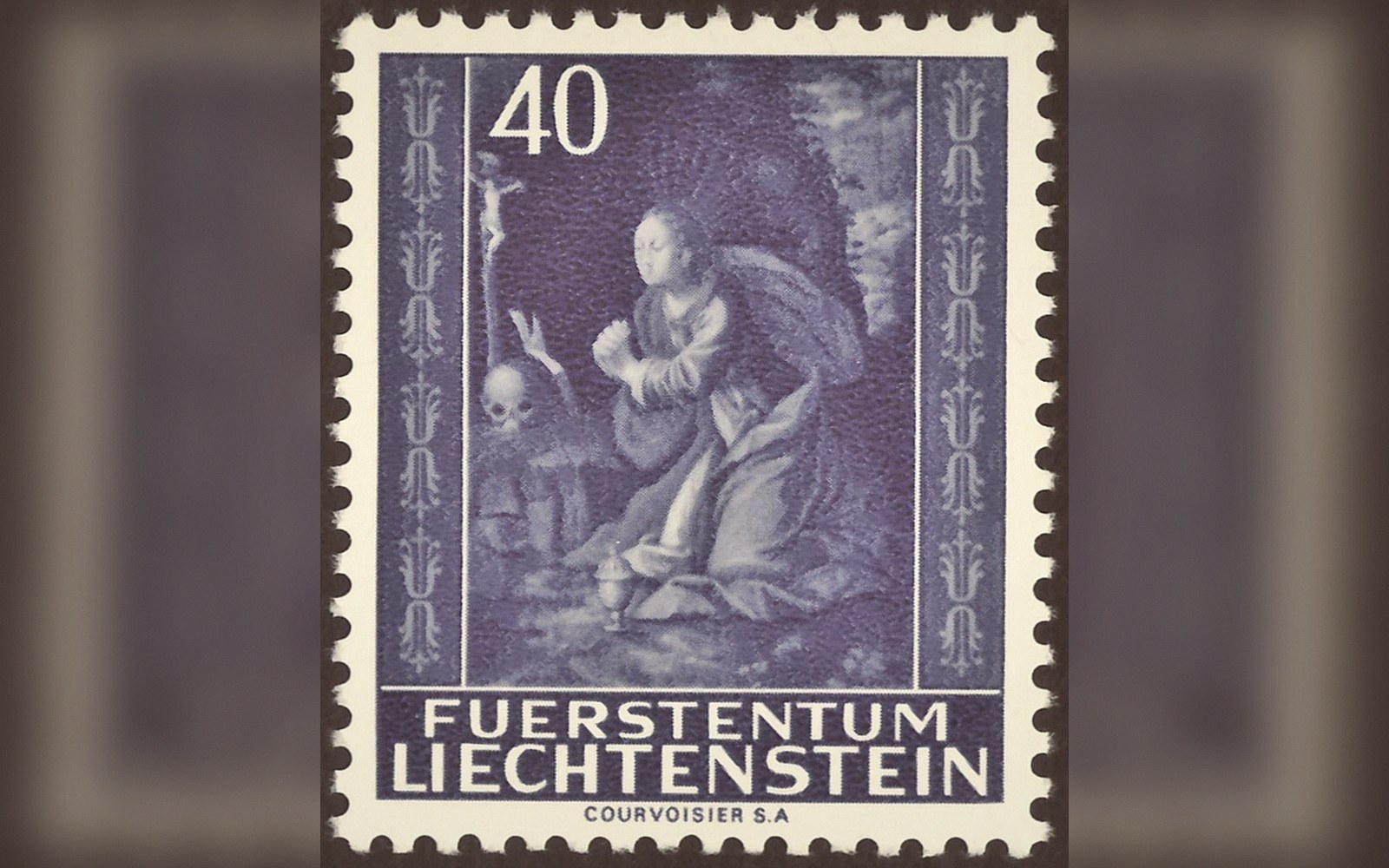 Liechtenstein 40 rappen stamp showing a kneeling figure praying before a crucifix